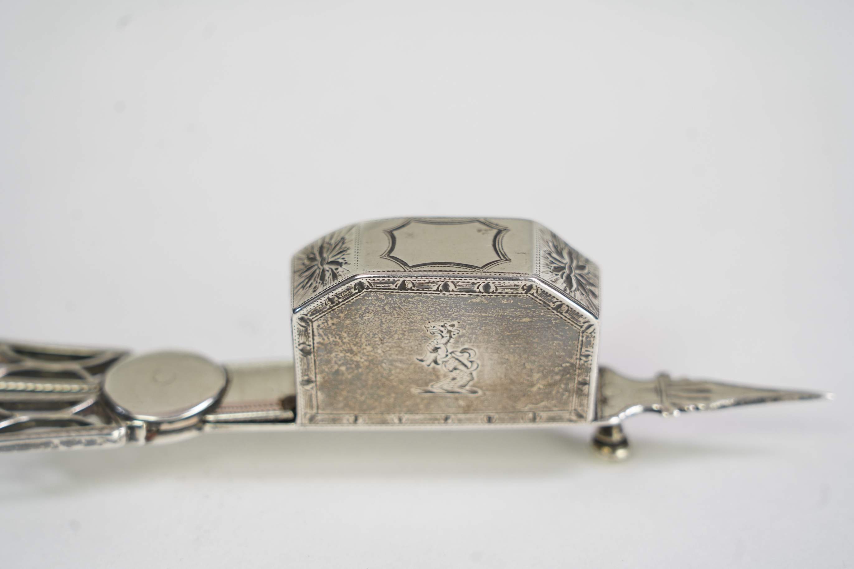 A set of twelve George III silver Hanoverian pattern table spoons by Walter Tweedie, the terminals engraved with the family crest of The Right Reverend Robert Lowth, Bishop of London, (1710-1787)